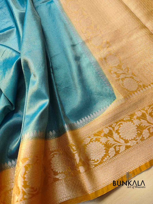 Peacock Blue Plain Soft Tissue Silk Saree with Yellow Floral Design Contrast Border