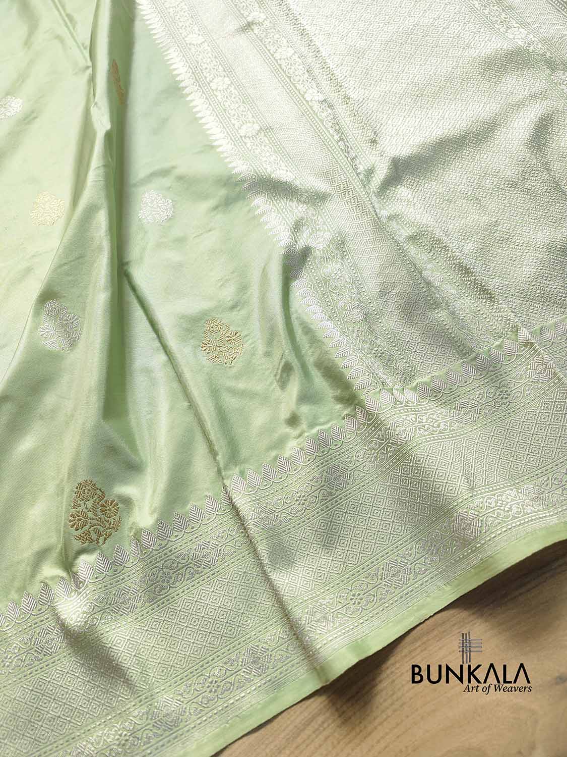 Pastel English Pista Green Double Tana Gold and Silver Zari Allover Small Buti Handloom Pure Katan Silk Banarasi Saree with Silver Zari Border