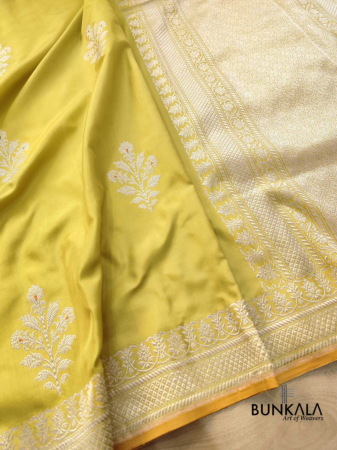 Yellow Greenish Pure Katan Silk Allover Silver Zari Hand Woven Kadwa Buta Ektara Banarasi Saree