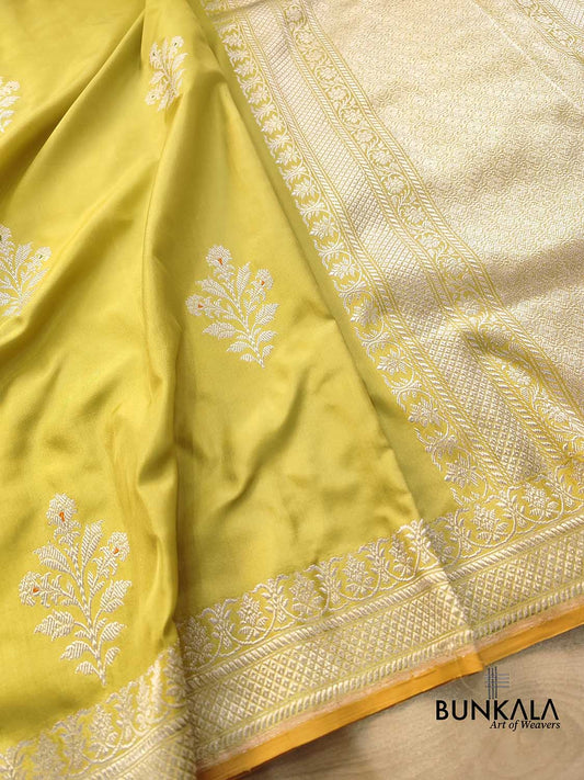Yellow Greenish Pure Katan Silk Allover Silver Zari Hand Woven Kadwa Buta Ektara Banarasi Saree