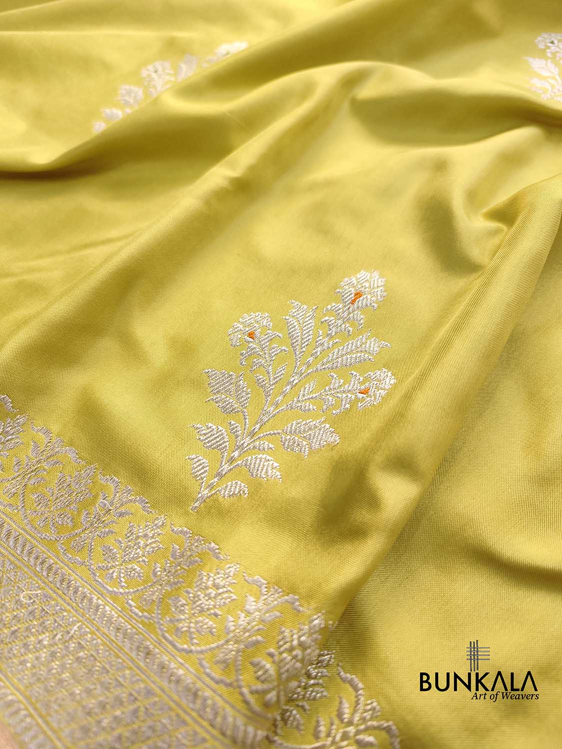 Yellow Greenish Pure Katan Silk Allover Silver Zari Hand Woven Kadwa Buta Ektara Banarasi Saree