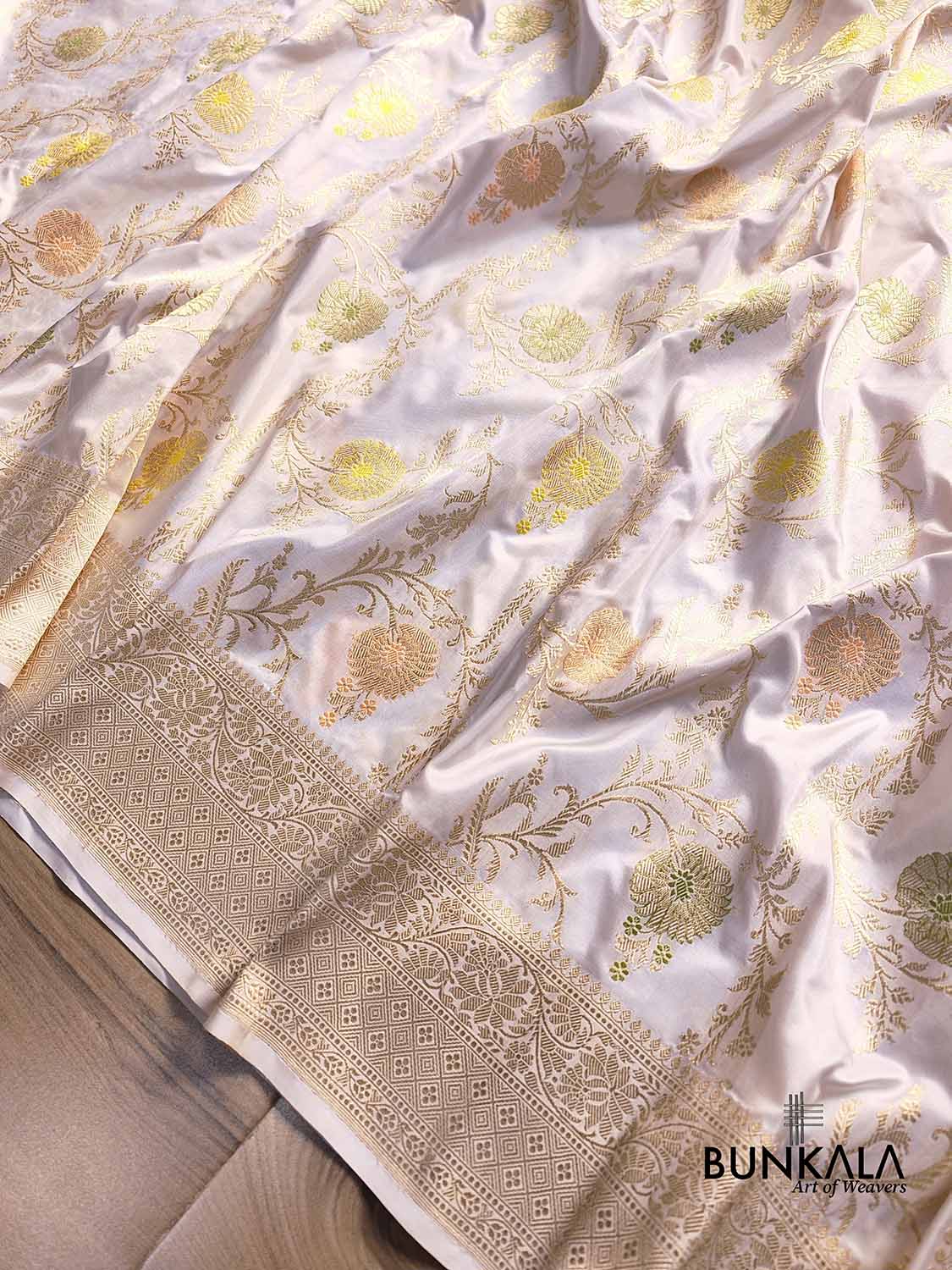 White Pure Katan Silk Kadwa Handweaved Sona Zari with Pastel Meenakari Floral Jangla Design Banarasi Saree