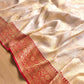 Off White Ektara Grace Pure Tissue Silk Kadwa Handwoven Sona Rupa Banarasi Saree with Red Contrast Border and Pallu