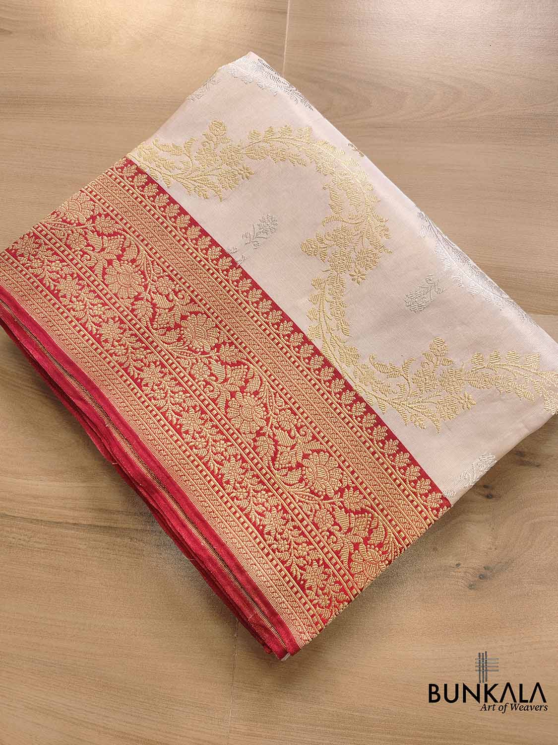 Off White Ektara Grace Pure Tissue Silk Kadwa Handwoven Sona Rupa Banarasi Saree with Red Contrast Border and Pallu