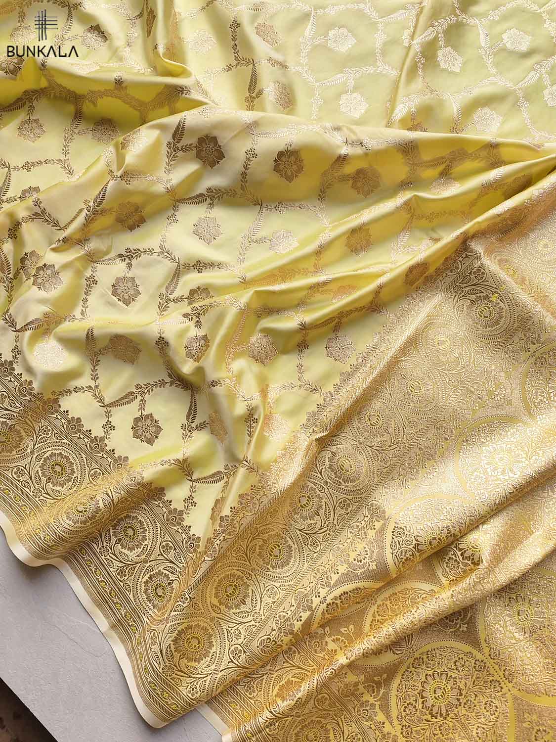 Yellow Mashru Silk Jaal Design Weaved Banarasi Saree