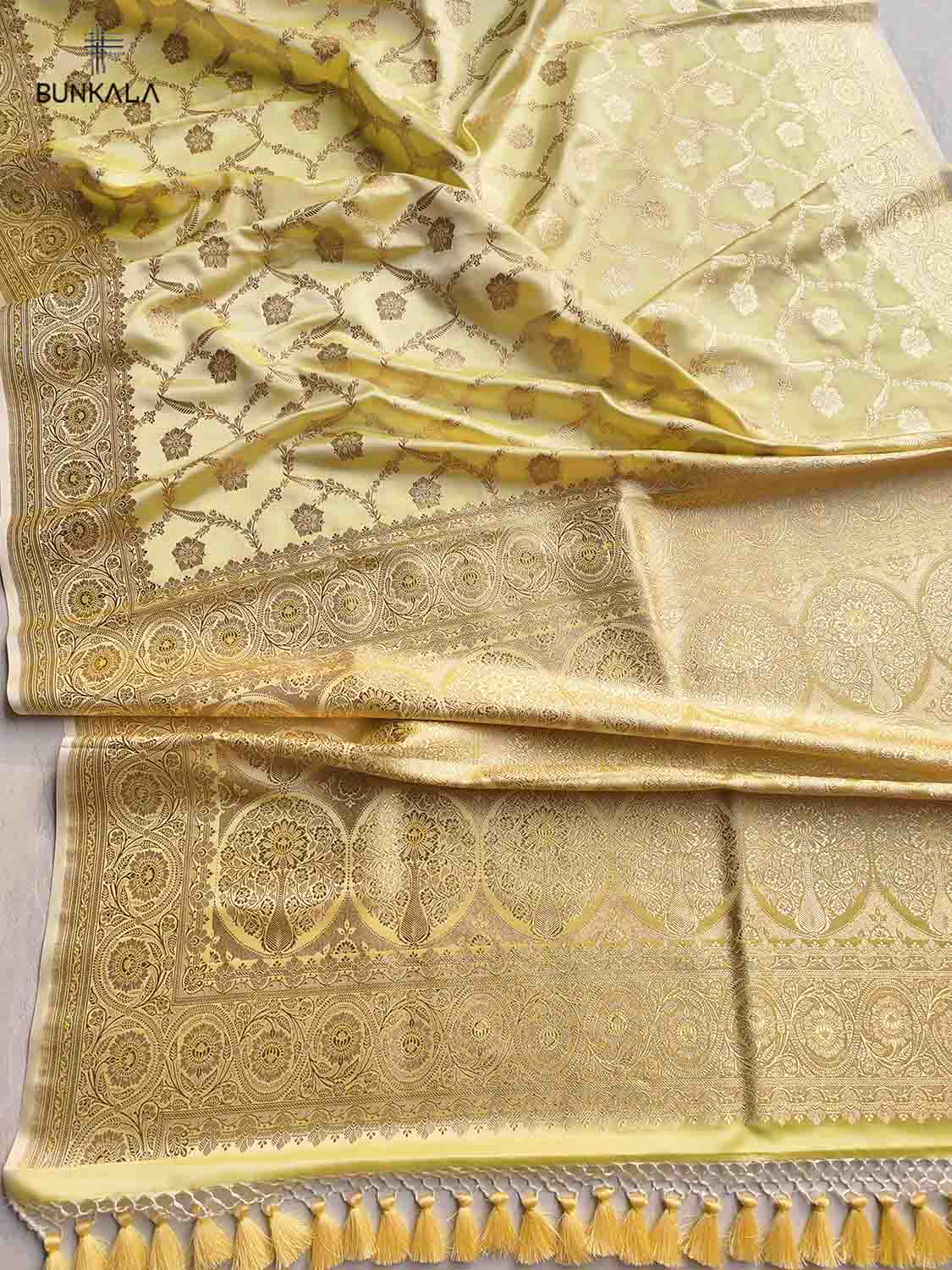 Yellow Mashru Silk Jaal Design Weaved Banarasi Saree