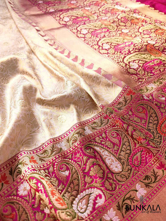 Exquisite Craftsmanship Off White Pure Katan Silk Handloom Brocade Banarasi Saree with Meenakari Border and Pallu