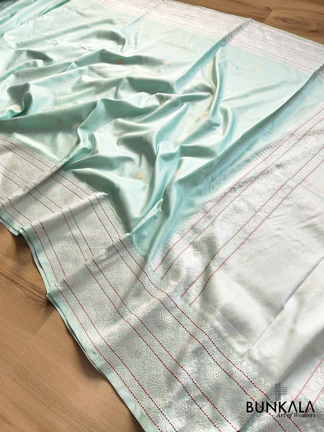 Ethereal Beauty Light Blue Pure Katan Silk Handloom Sona Rupa Allover Small Buti Banarasi Saree with Silver Zari Border and Pallu